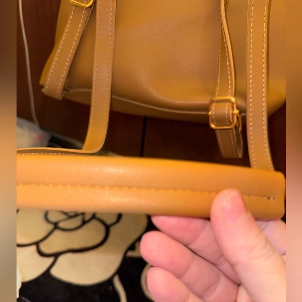 GORGEOUS CAMEL COLOR MINI BACKPACK WITH CONVERTIBLE STRAPS AND ACCENT TASSELS